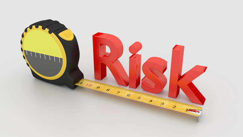 Tape placed next to the red word risk measure concept 3D illustration on white